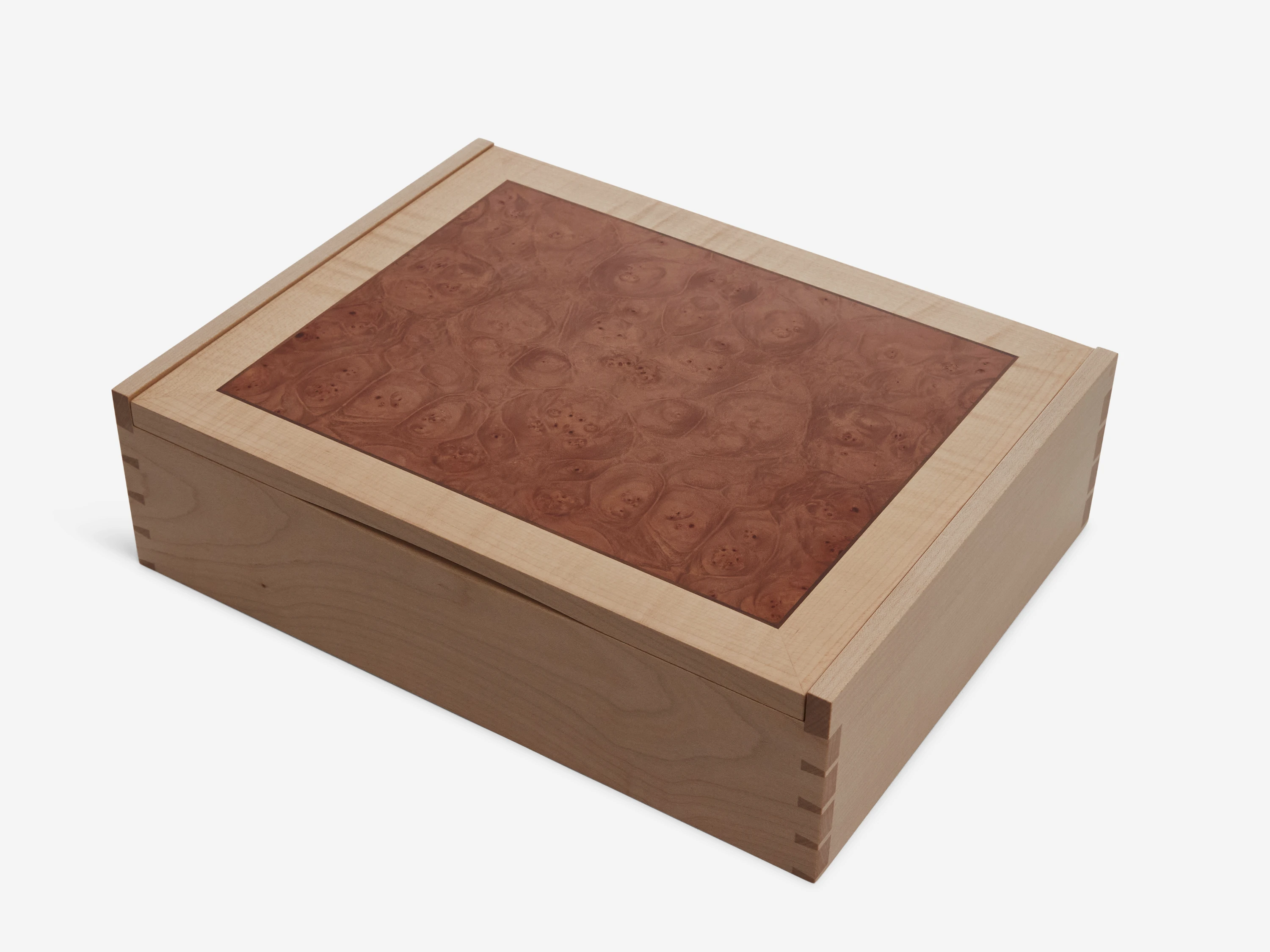 Solid sycamore through-dovetail box with veneered lid and base